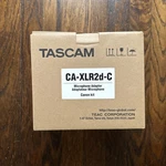 Tascam CA-XLR2D-C Microphone Adapter For Canon Open Box. Fixed Price $389.00.