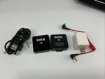 Rode Wireless Go Microphone And Receiver System, 100%, With Cables, Charger. Fixed Price $35.00.