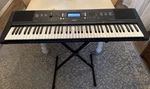 Yamaha PSR-EW310 76-KEYS Electronic Keyboard With Black Stand. Fixed Price $220.00.