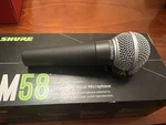 Shure SM58 Professional Cardioid Dynamic Legendary Vocal Microphone.. Fixed Price $79.99.