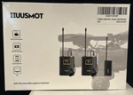 Huusmot WM-102A Black Video Recording Uhf Wireless Lavalier Microphone System. Fixed Price $30.00.