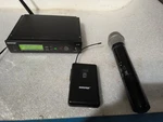 Shure SLX4 Wireless System Receiver & SLX1 And Microphone Beta 87A. Fixed Price $279.99.