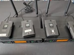 Wireless Mic Receiver And 4 Body Pack Transmitters Used Jts RU-8012DB/RU-850LTB. Fixed Price $1000.00.