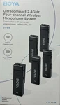Boya BY-W4 Ultracompact 2.4GHZ Four Channel Wireless Microphone System. Fixed Price $65.00.