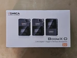 Comica Boomx-d D2 2.4G Digital 1-TRIGGER-2 Wireless Lavalier Microphone. Fixed Price $50.00.