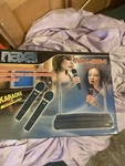 Naxa Professional Dual Wireless Microphone Kit W/ Receiver - New (open). Fixed Price $23.00.
