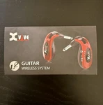 Xvive U2 Guitar Wireless System - Red. Fixed Price $79.00.