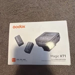 Godox Magic XT1 2.4GHZ Dual-channel Wireless Clip-on Microphone System W/ Case. Fixed Price $44.99.
