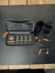 Comica Vimo Q Four-channel Wireless Lavalier Microphone System W/ Charging Case. Fixed Price $150.00.