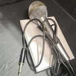 Realistic 33-985A Wired Handheld Microphone, On/off Switch, 6.35MM 1/4" Ts. Fixed Price $9.00.