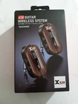 Xvive Audio U2 Digital Wireless Guitar System - Rosewood 5.8GHZ. Fixed Price $119.99.