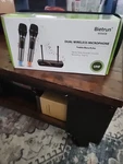 WXM08 Uhf Portable Dual Wireless Karaoke Microphones With Treble, Bass And Echo. Fixed Price $25.00.