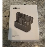 Dji Wireless Dual-channel Microphone System W/ Charging Case, 250M Range. Fixed Price $100.00.