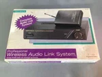 Optimus Wireless Audio Link System 32-1235. Fixed Price $28.99.